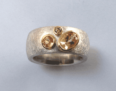 Serling silver, 18 carat yellow gold, imperial topaz, citrine, cinnamon diamonds
