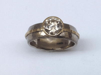 18 carat white and yellow gold, diamond