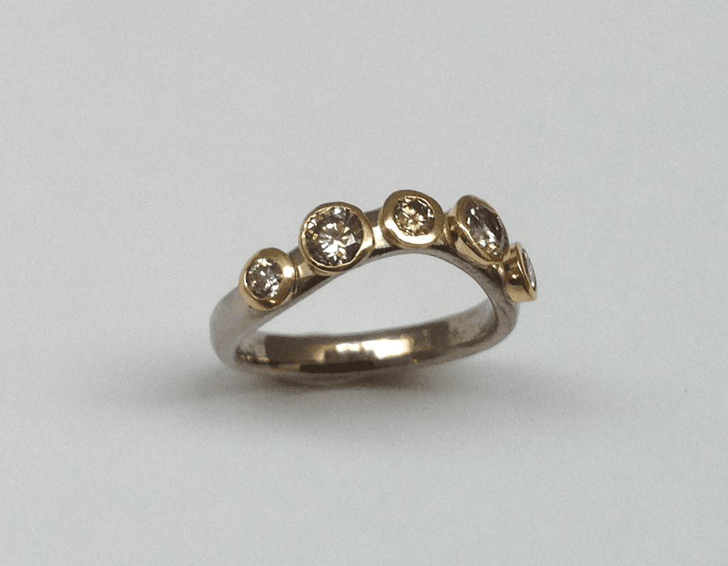 18 carat white and yellow gold, cinnamon diamonds