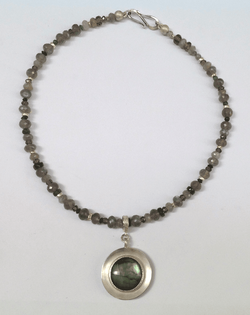 Sterling silver, 18 carat yellow gold, labradorite