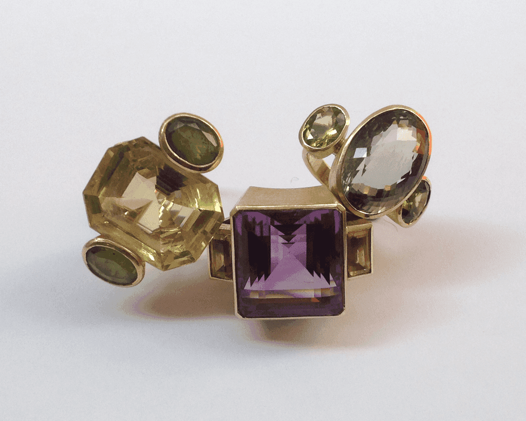 Large 18 carat gold cocktail rings, various gemstones