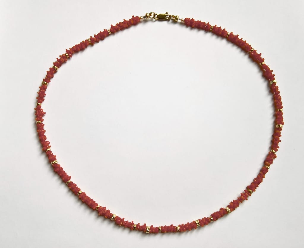 Coral necklace with 18 carat gold details