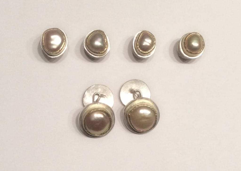 Shirt studs and matching cufflinks. Natural coloured freshwater pearls set in 18 carat yellow gold, sterling silver base.