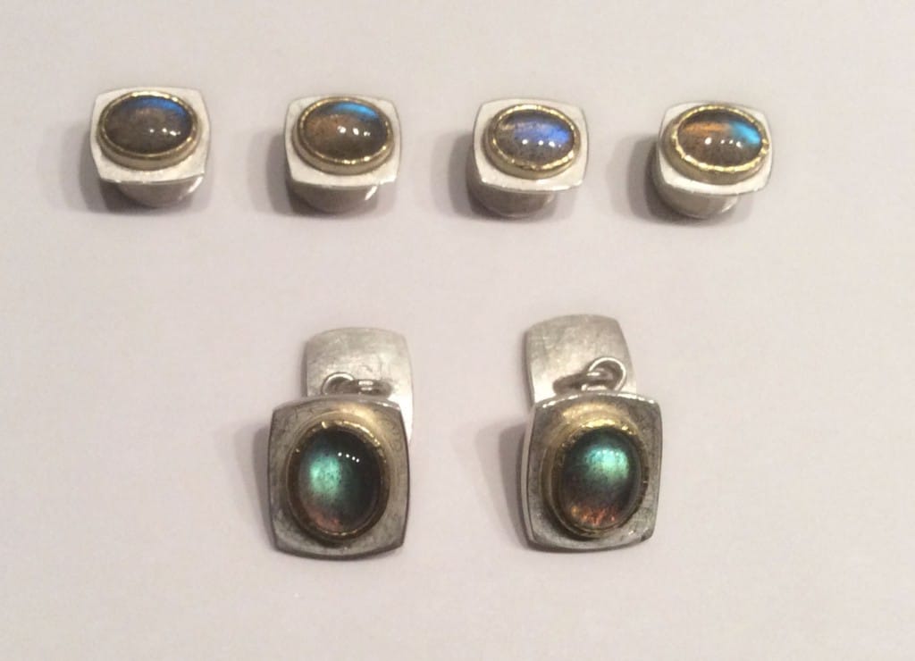 Shirt studs and matching cufflinks. Labradorite set in 18 carat yellow gold, sterling silver base.