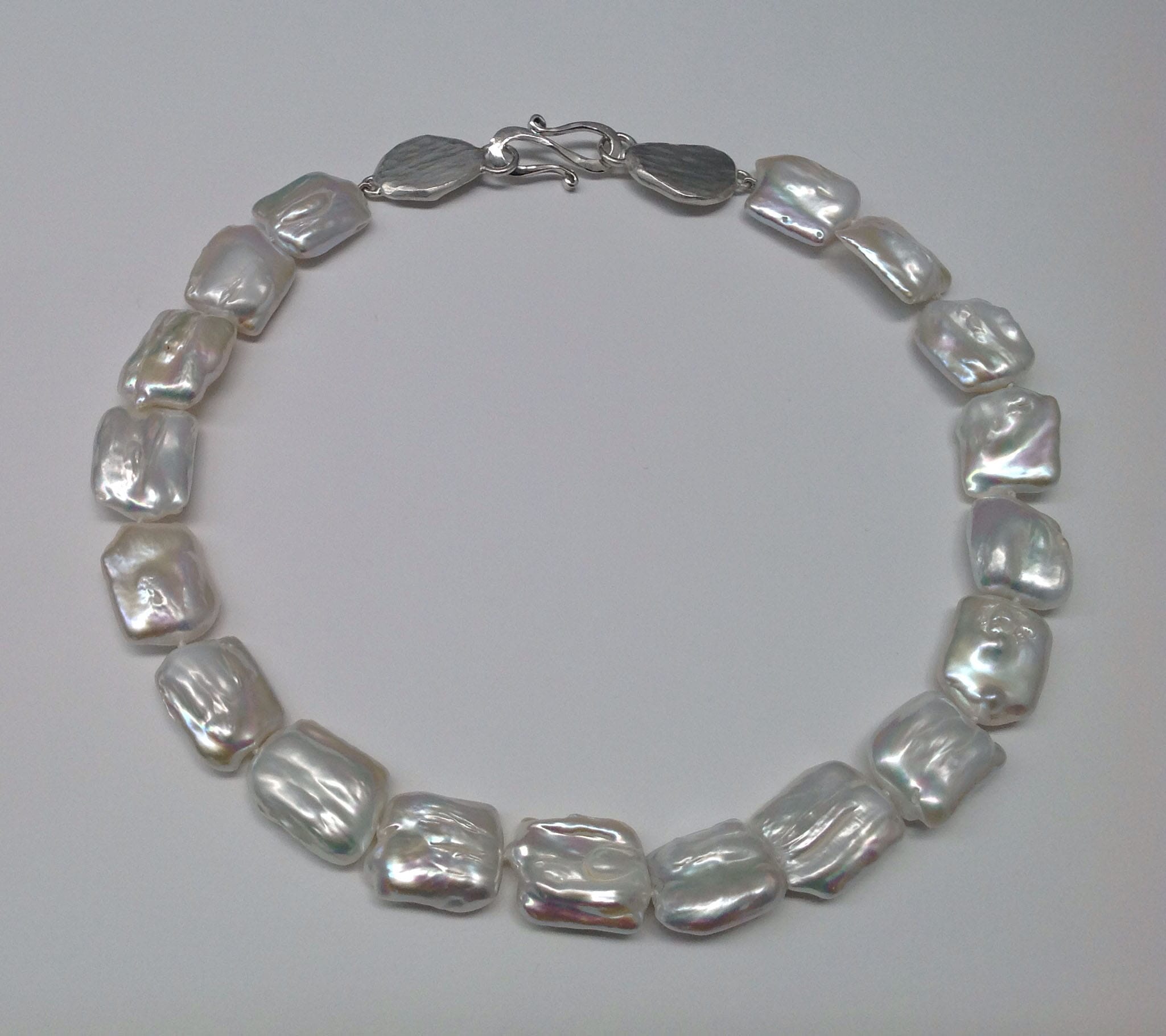 Cushion shaped silver white freshwater pearls, sterling silver clasp