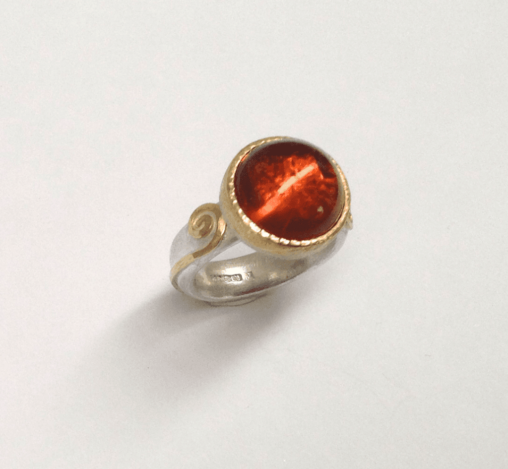 Madeira citrine set in 18 carat yellow gold, sterling silver