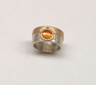 Fire opal set in 9 carat rose gold, cinnamon diamond, sterling silver