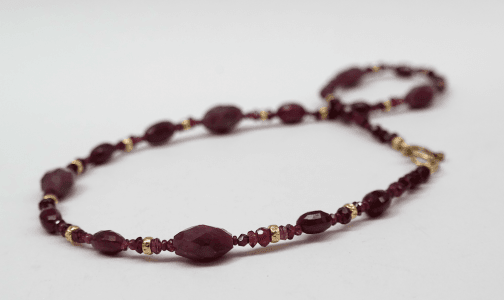 Ruby beads, 18 carat yellow gold beads