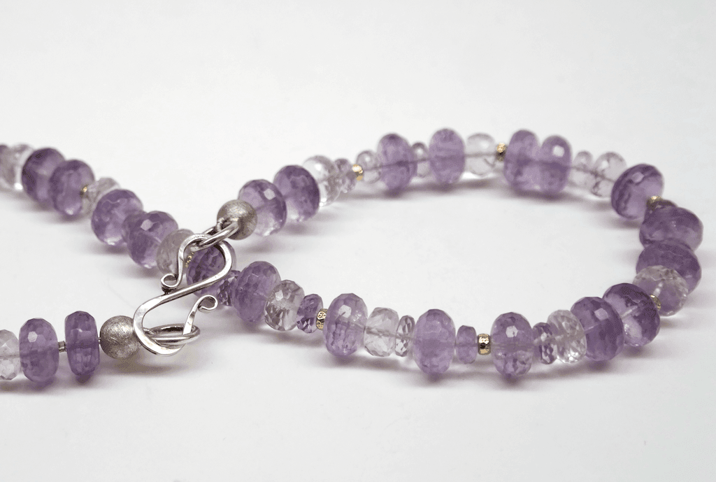 Amethyst and kunzite beads, 18 carat yellow gold beads