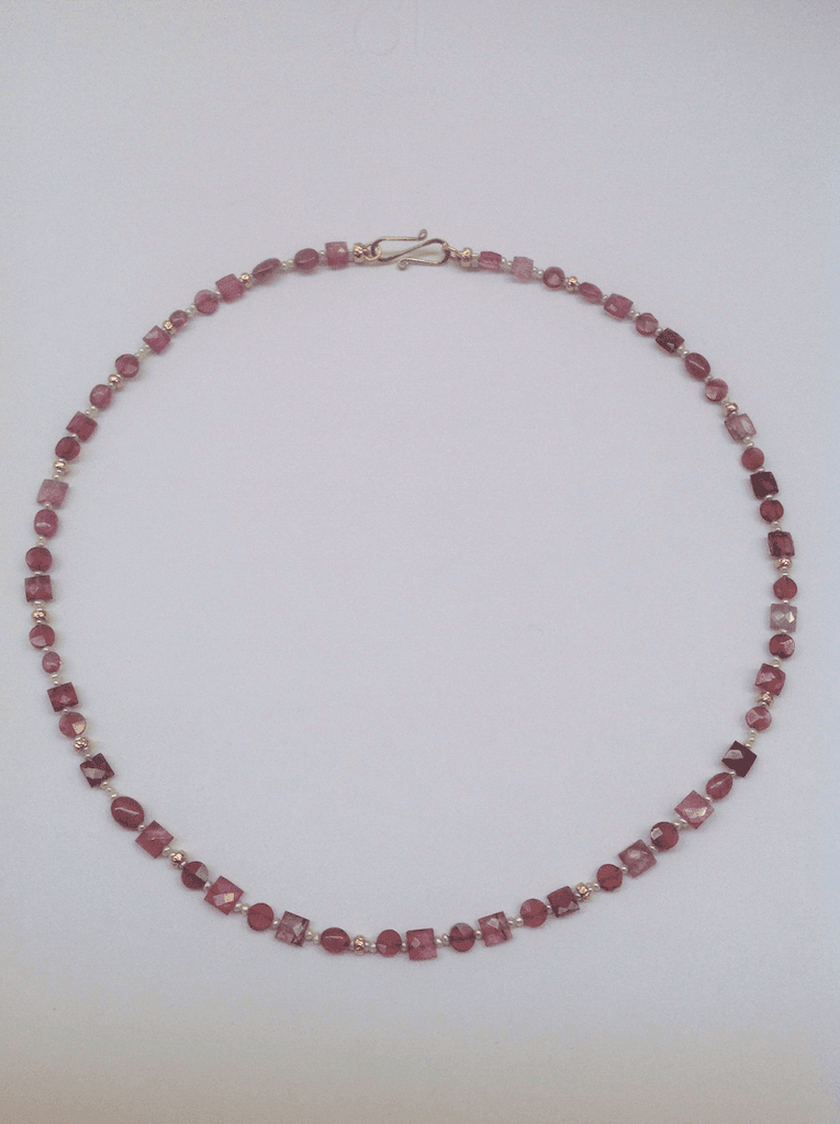 Pink tourmaline and garnet beads, pink pearls and 18 carat gold yellow beads