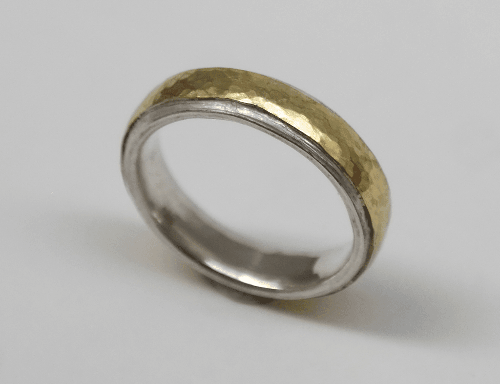 Sterling silver, 18 carat yellow gold detail
